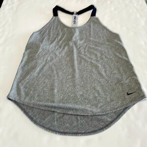 Nike woman’s running shirt in excellent condition.